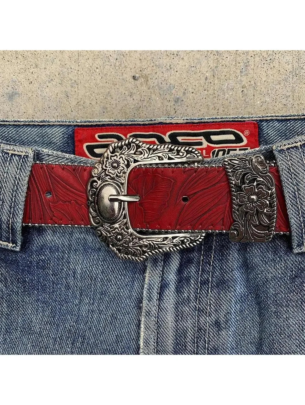 Red Western Floral belt with silver belt buckle. 38 inches length